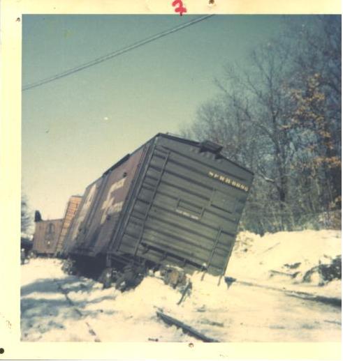 box car derailed in snow